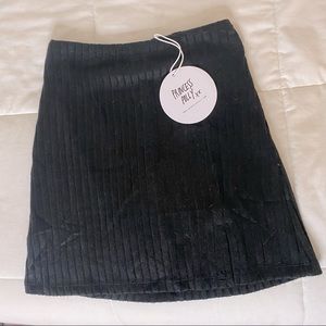 Black ribbed mini skirt